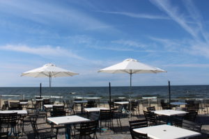 Oceanside Dining Outdoor Commercial Steel Side Chairs and Laminate Table Top